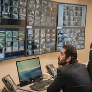 Wincon security guards virtually monitoring large condo building